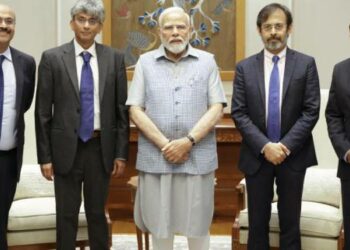 PM Modi along with Network18's Editor-in-Chief Rahul Joshi (right to PM), Santosh Menon, Chief Content Officer, Network18 (second right to PM), Karthik Subbaraman, Managing Editor (digital)-Network18 (left to PM), Moneycontrol’s Chief Content & Strategy Officer Javed Sayed (second left to PM)